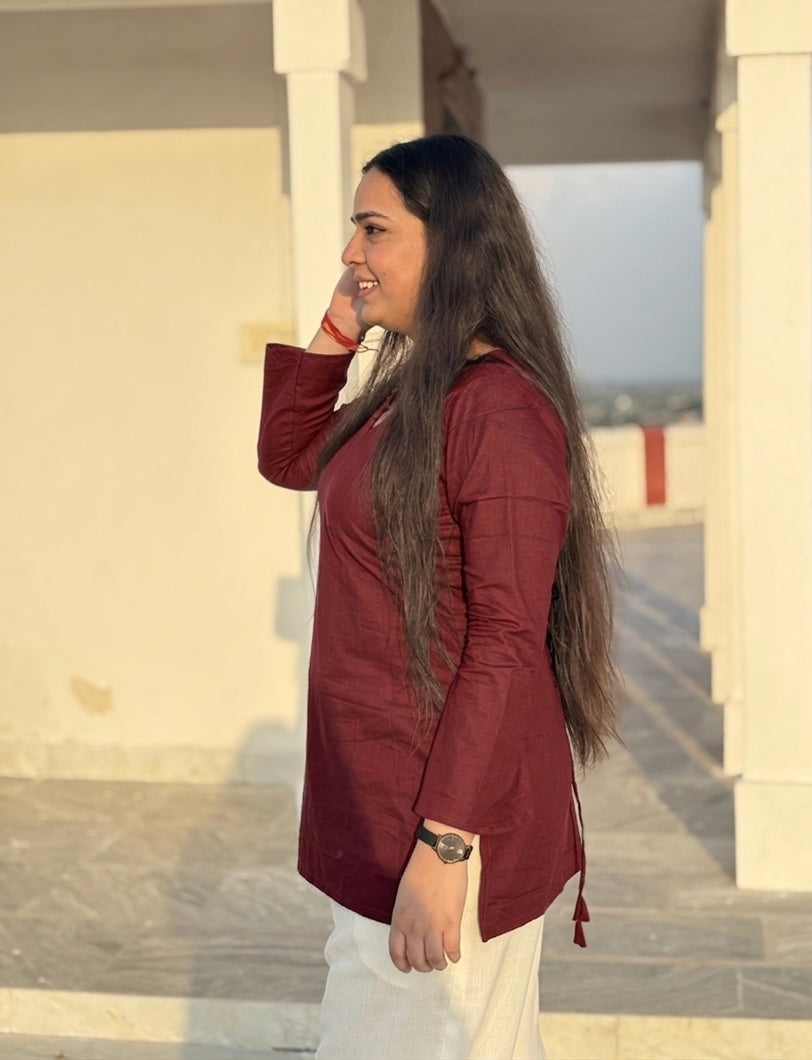 Kush:- Maroon bell sleeves short kurti