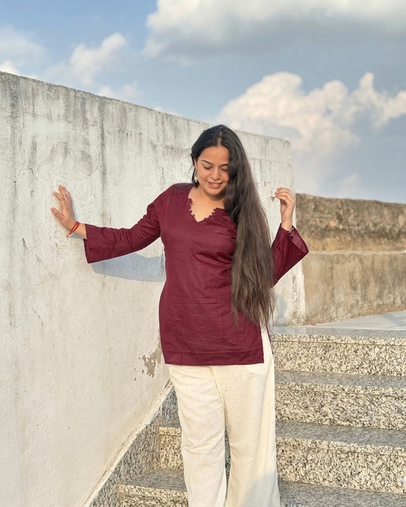 Kush:- Maroon bell sleeves short kurti