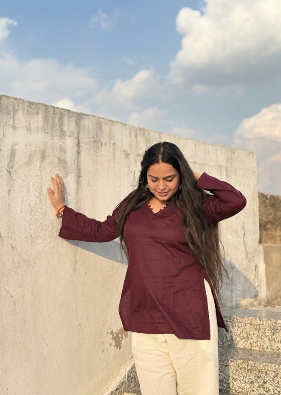 Kush:- Maroon bell sleeves short kurti