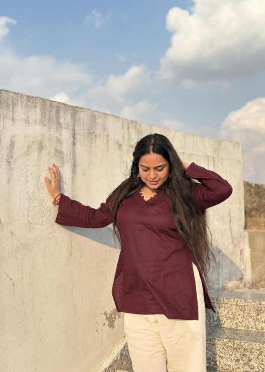 Kush:- Maroon bell sleeves short kurti